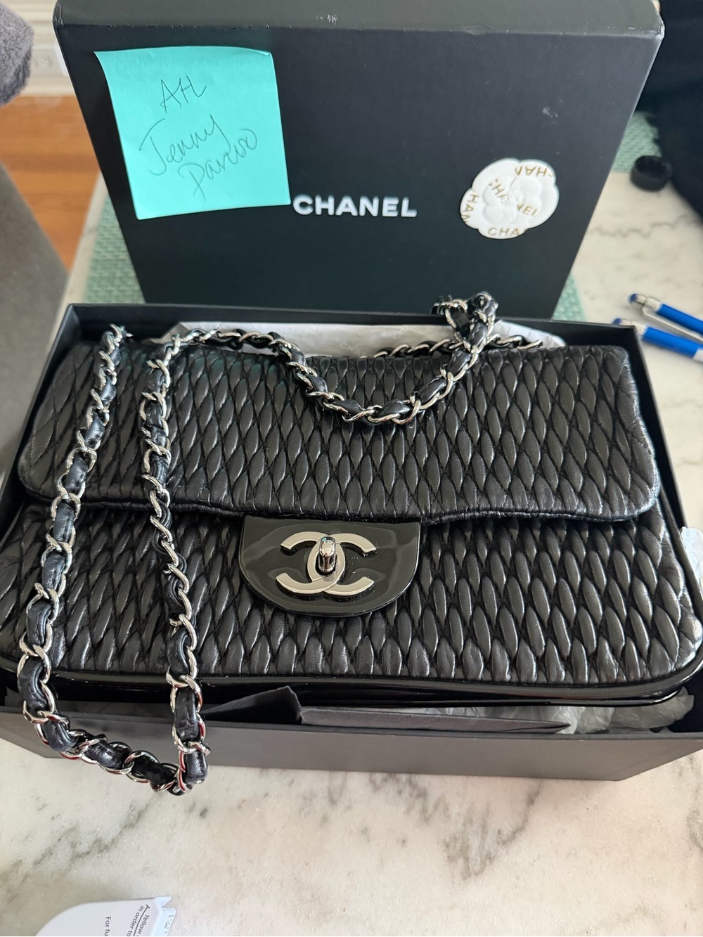 CHANEL Black Quilted Chain Shoulder Bag with Silver Hardware